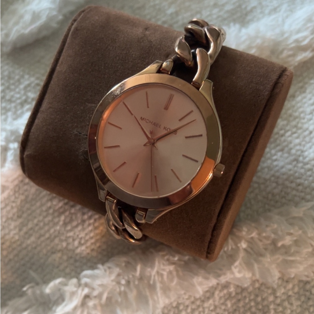Woman’s rose gold Michael kors watch